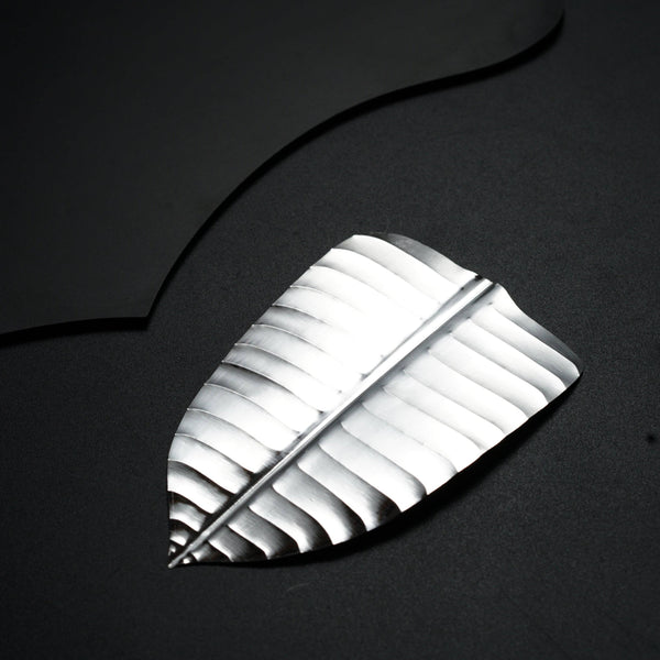 a piece of metal sitting on top of a table