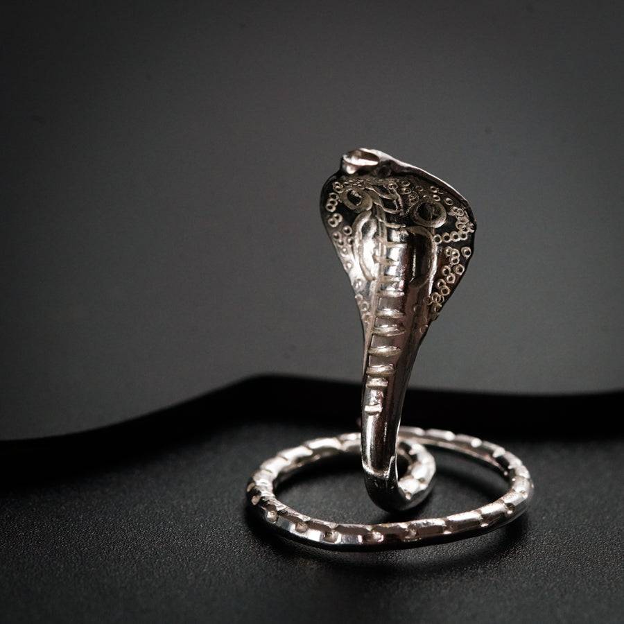 a silver ring with an elephant head on it