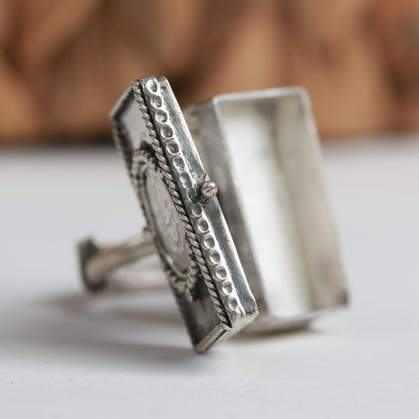 a close up of a ring on a table