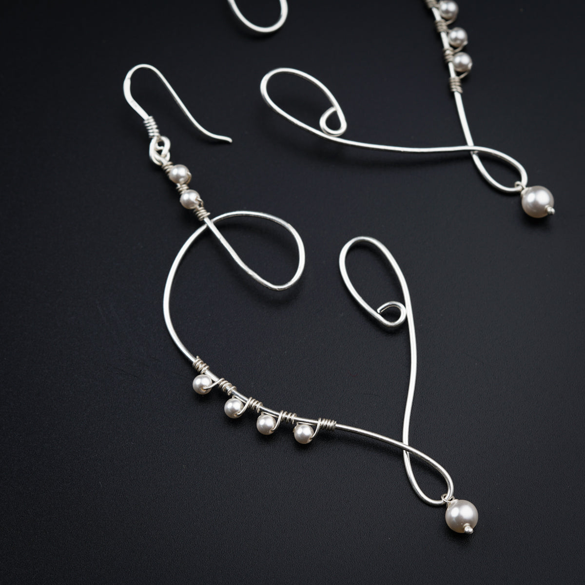 Abstract silver handmade earrings