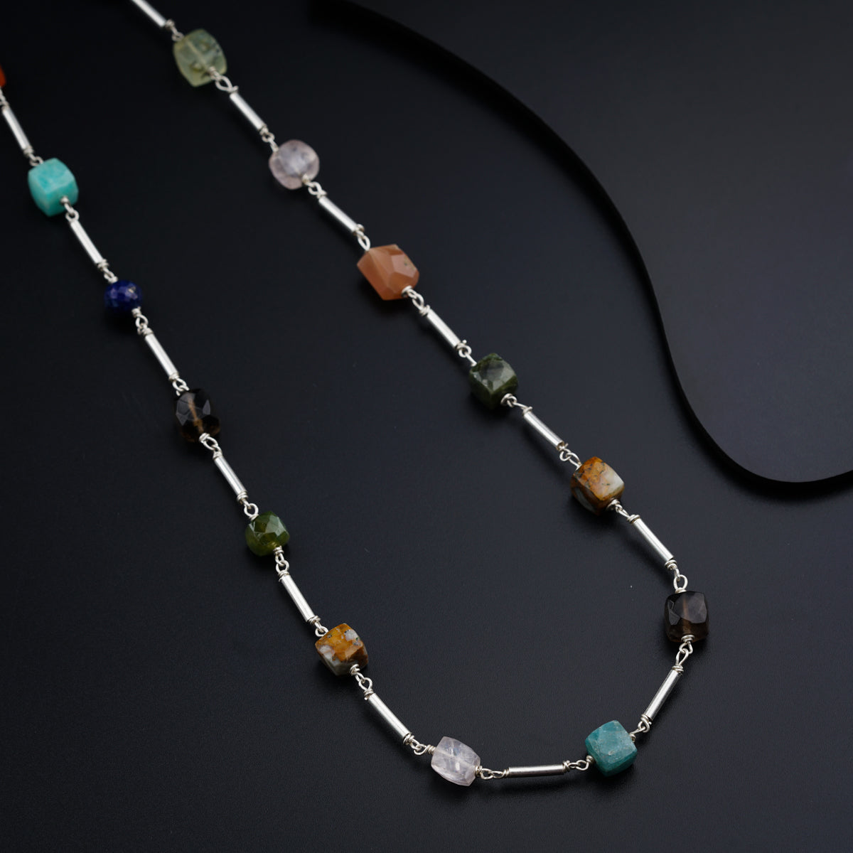 Silver pipe necklace with multicolored stones