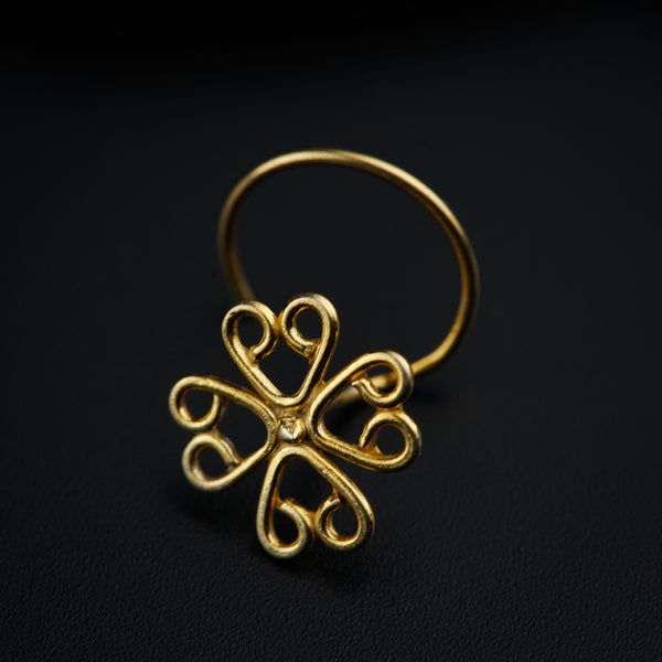 a gold ring with hearts on it