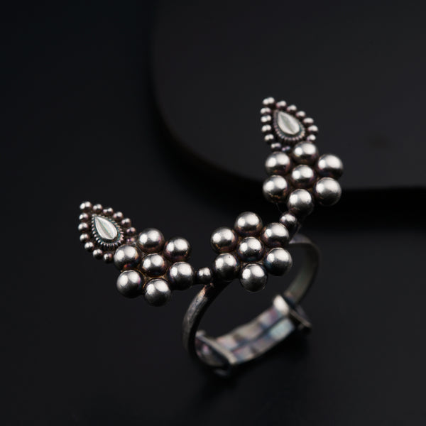 a close up of a ring on a black surface