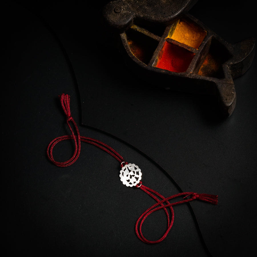a pair of scissors and a rope on a table