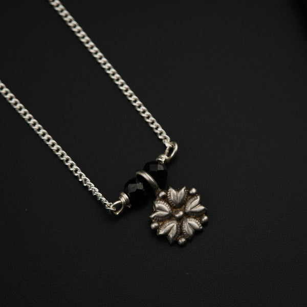 Silver Mangalsutra with black beads and floral pendant