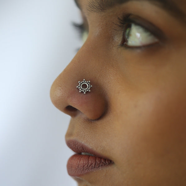 Minimal silver Kiara nose pin detailing