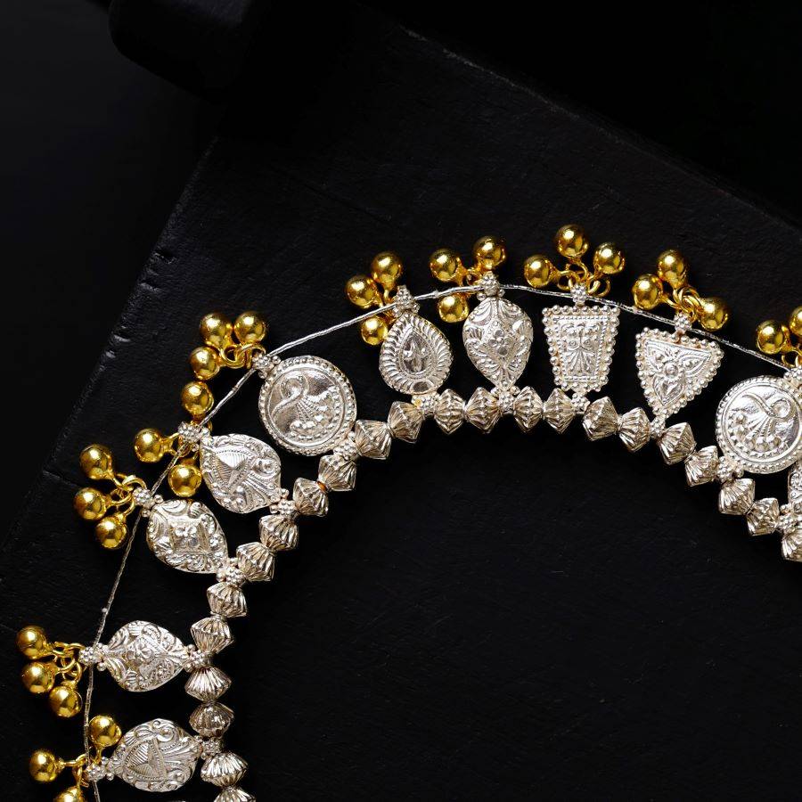 a close up of a gold and silver tiara