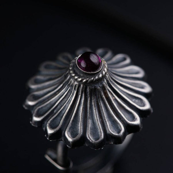 a close up of a ring with a stone