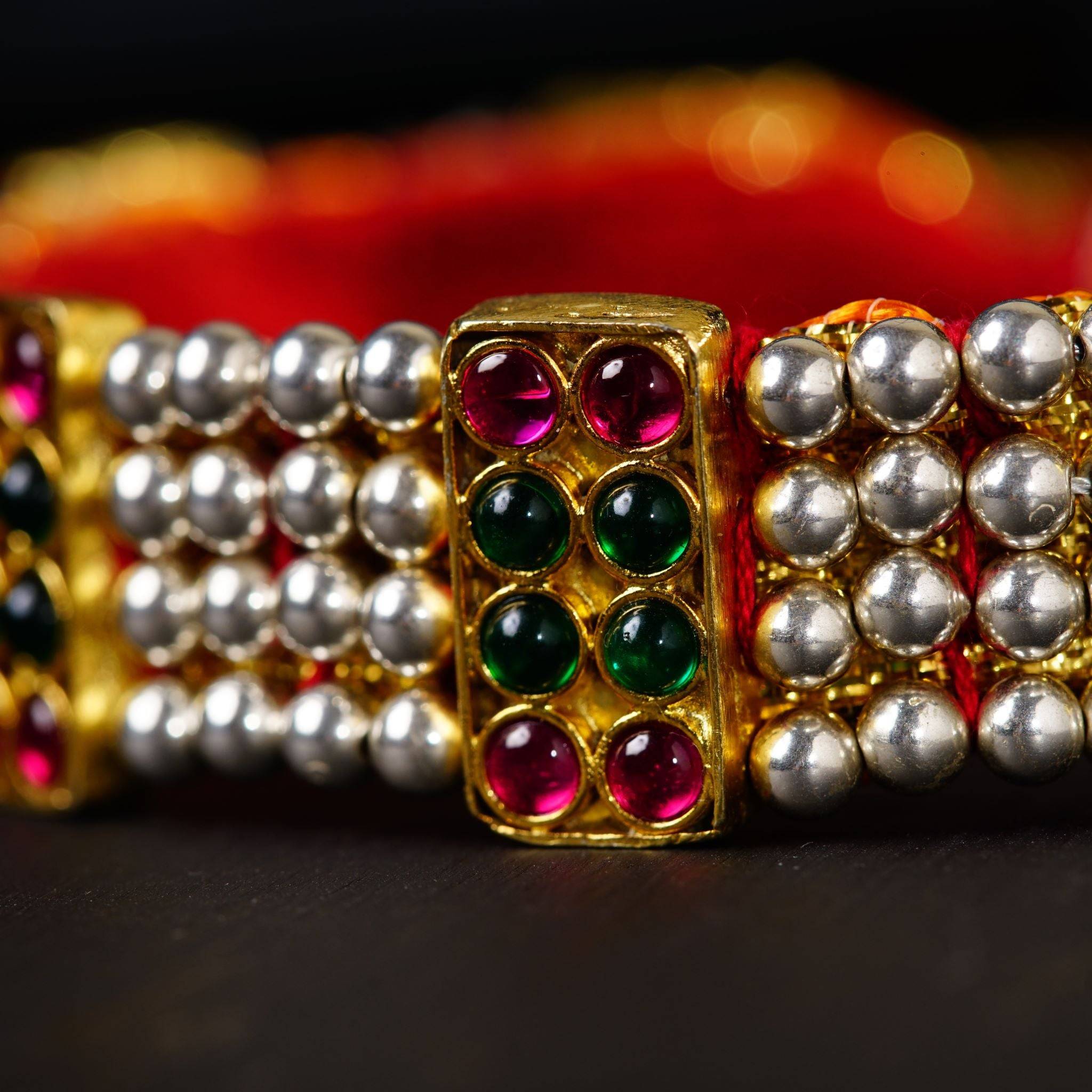 a close up of a bracelet with beads