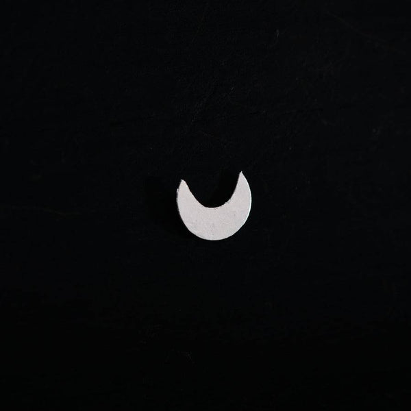 a white crescent on a black background