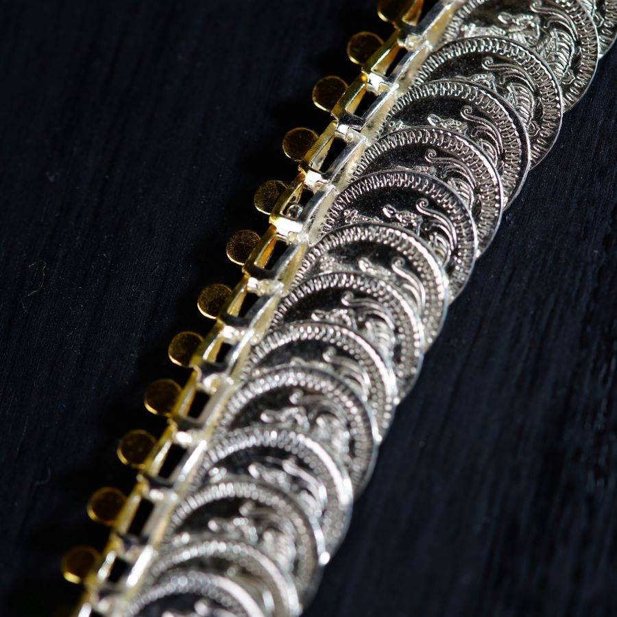a close up of a metal chain on a table