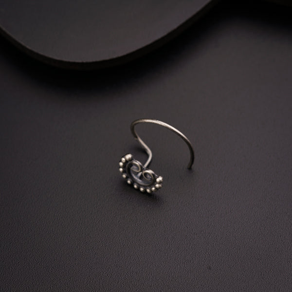 a close up of a ring on a table
