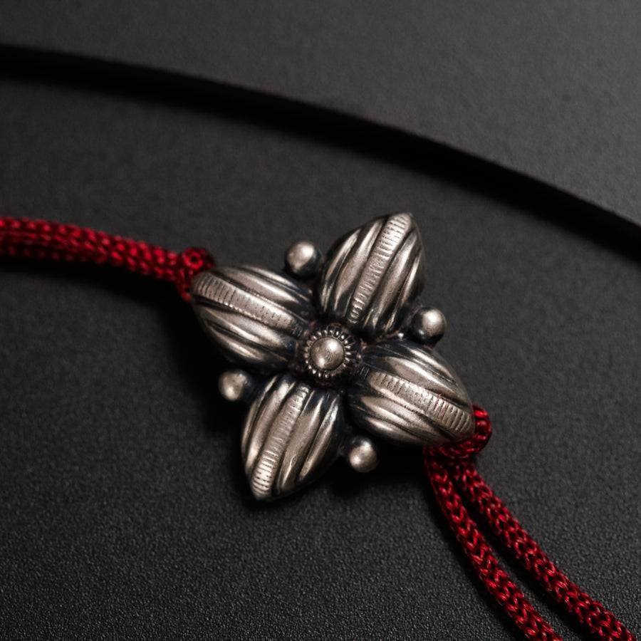 Handcrafted Silver Rakhi/Pendant: Flower
