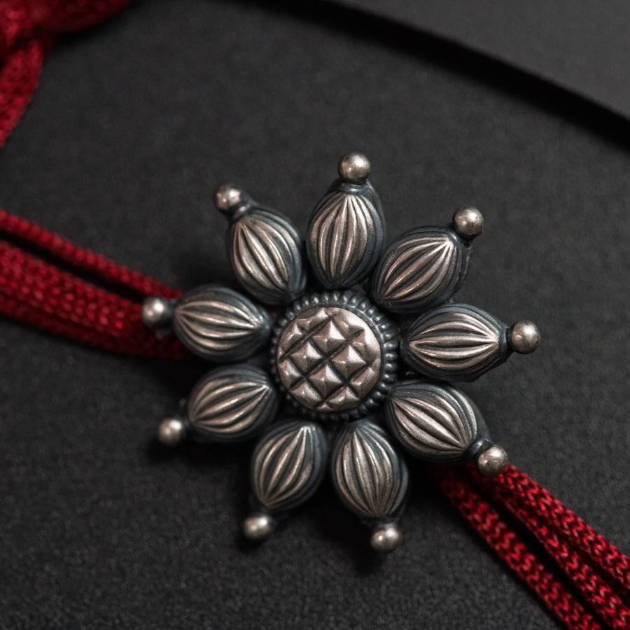 Handcrafted Silver Rakhi/Pendant: Big Flower