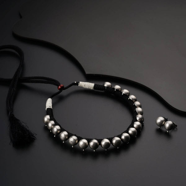 a couple of bracelets sitting on top of a table