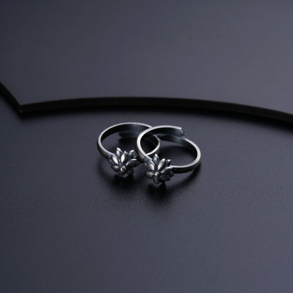 a pair of rings sitting on top of a table